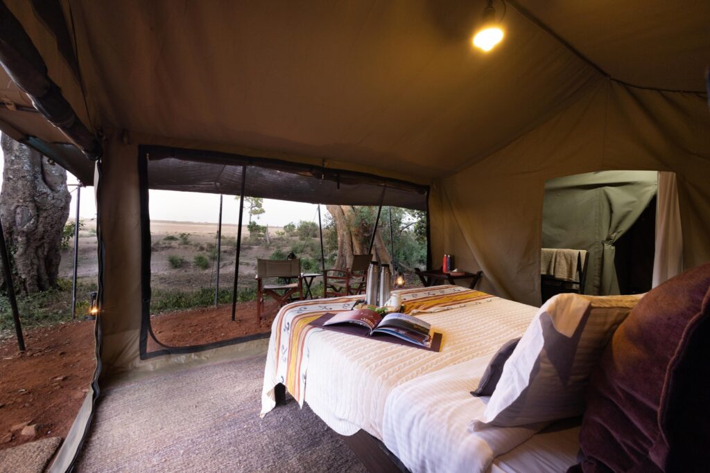 a view of masai mara from basecamp tent in masai mara
