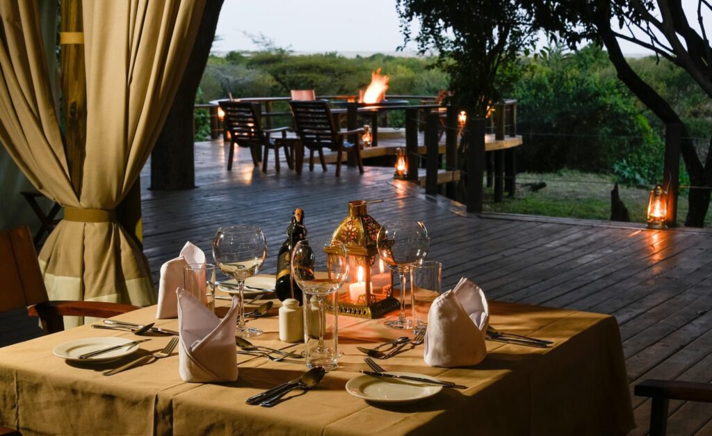 dinner at your tent in Ilkeliani Camp Masai Mara