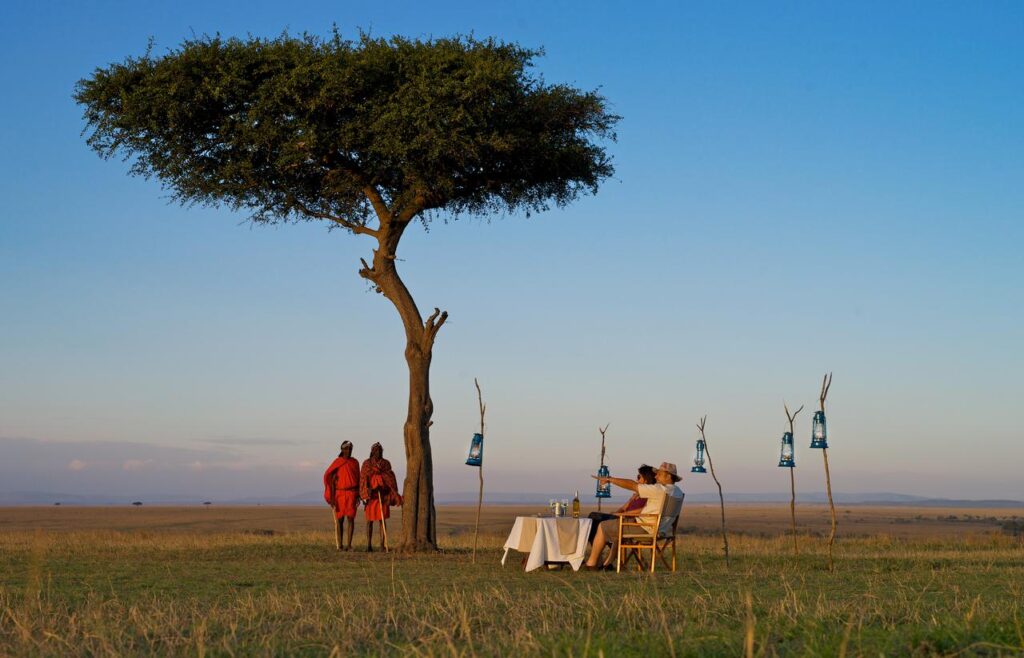 sunset drink at masai mara national park while at Ashnil Mara Camp