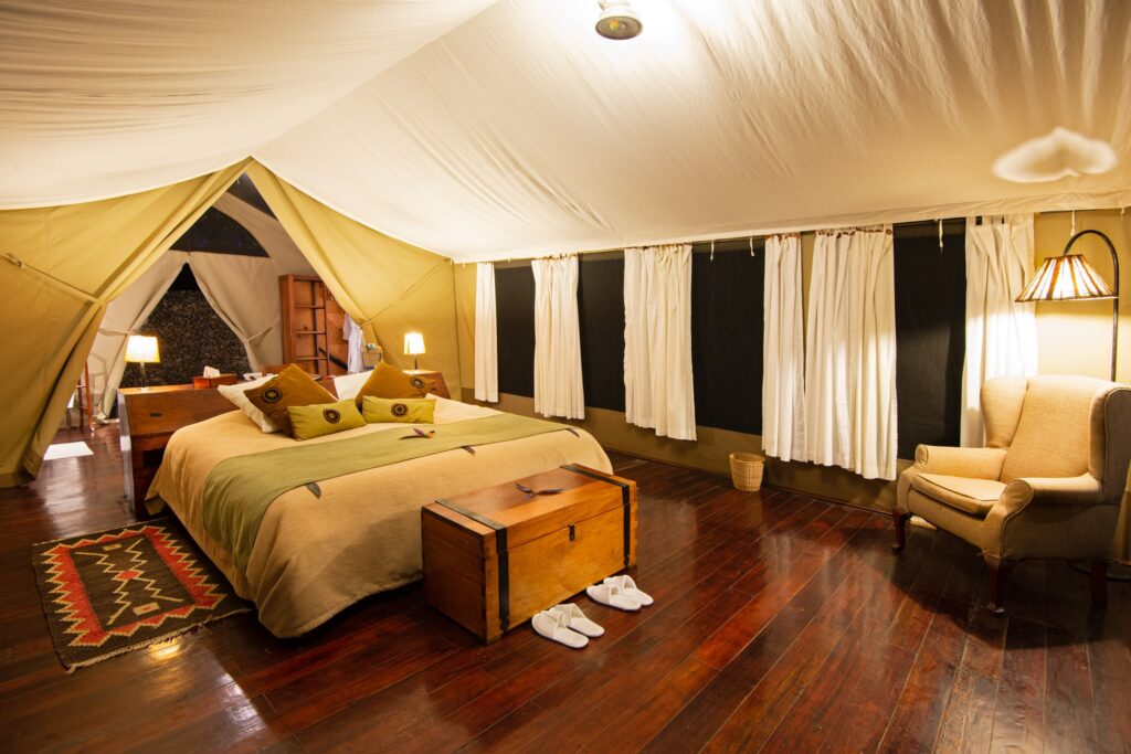 beds in Karen Blixen Luxury Safari Camp tent