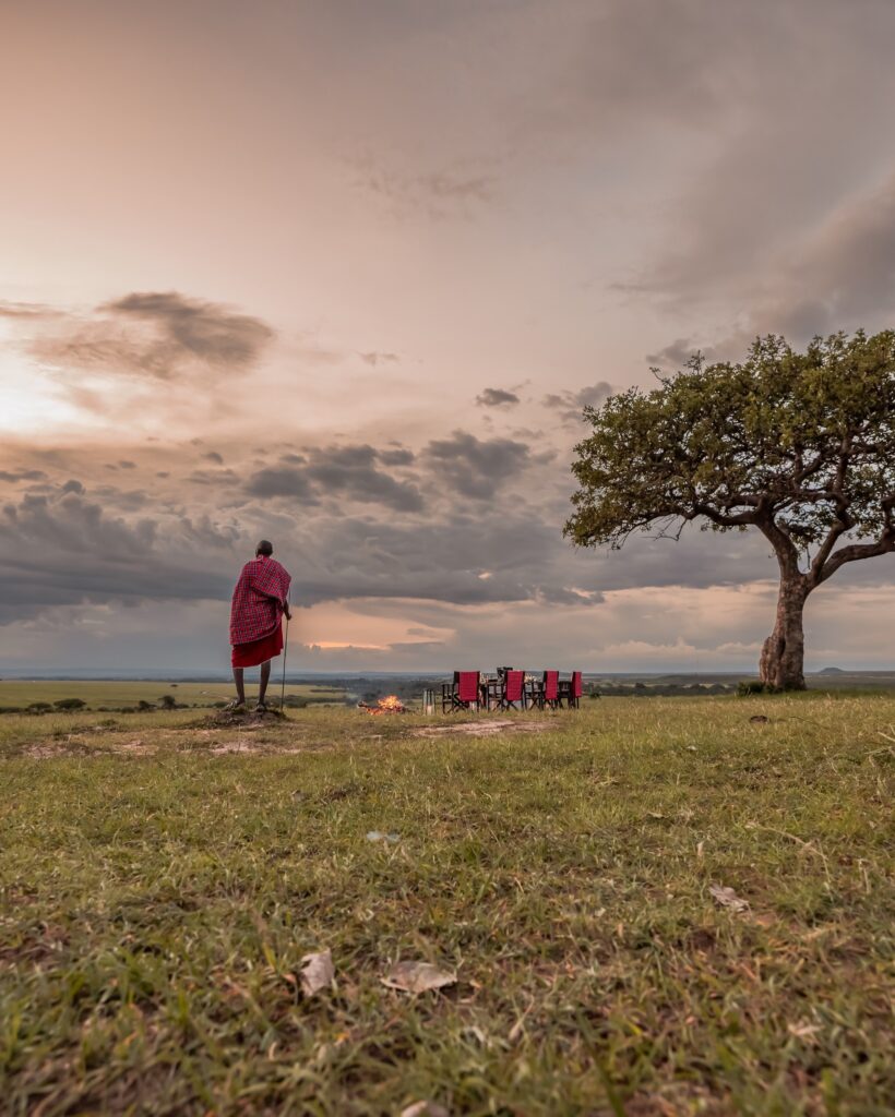 lunch in the wild guarded by a masai warrior at JW Marriott Masai Mara Lodge