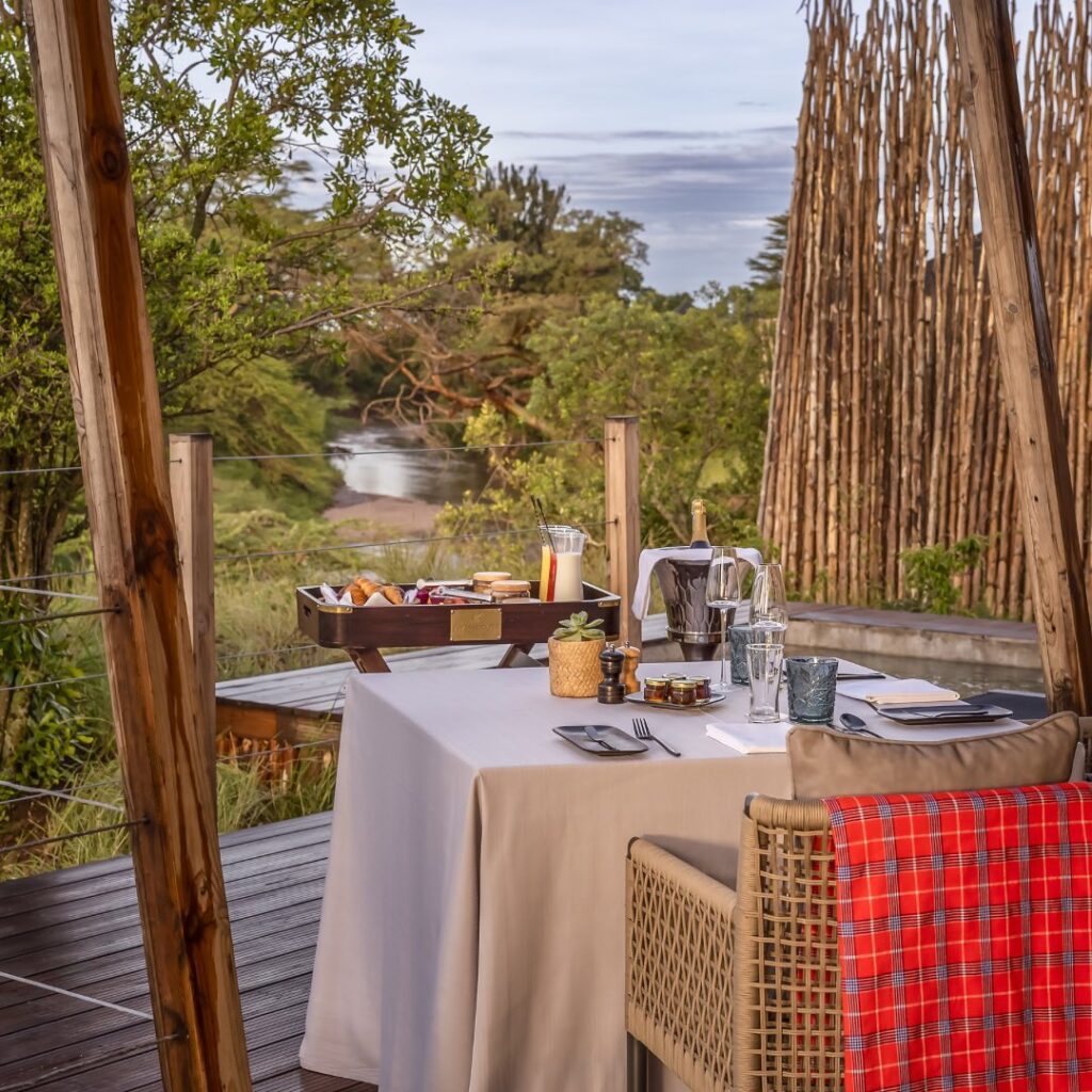 romantic breakfast with a breathtaking view of mara river at JW Marriott Masai Mara Lodge