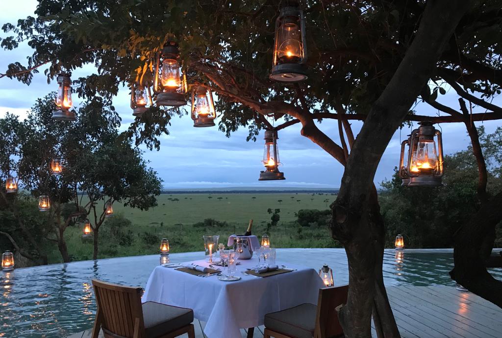 romantic poolside dinner at AndBeyond Bateleur Camp
