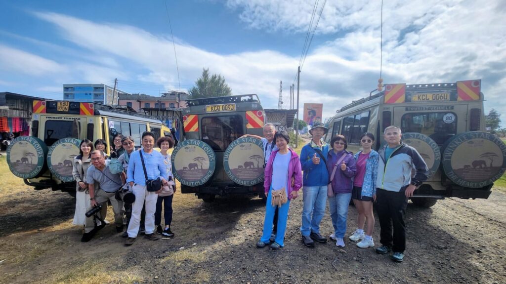 Tourists enjoying a safari in Masai mara
