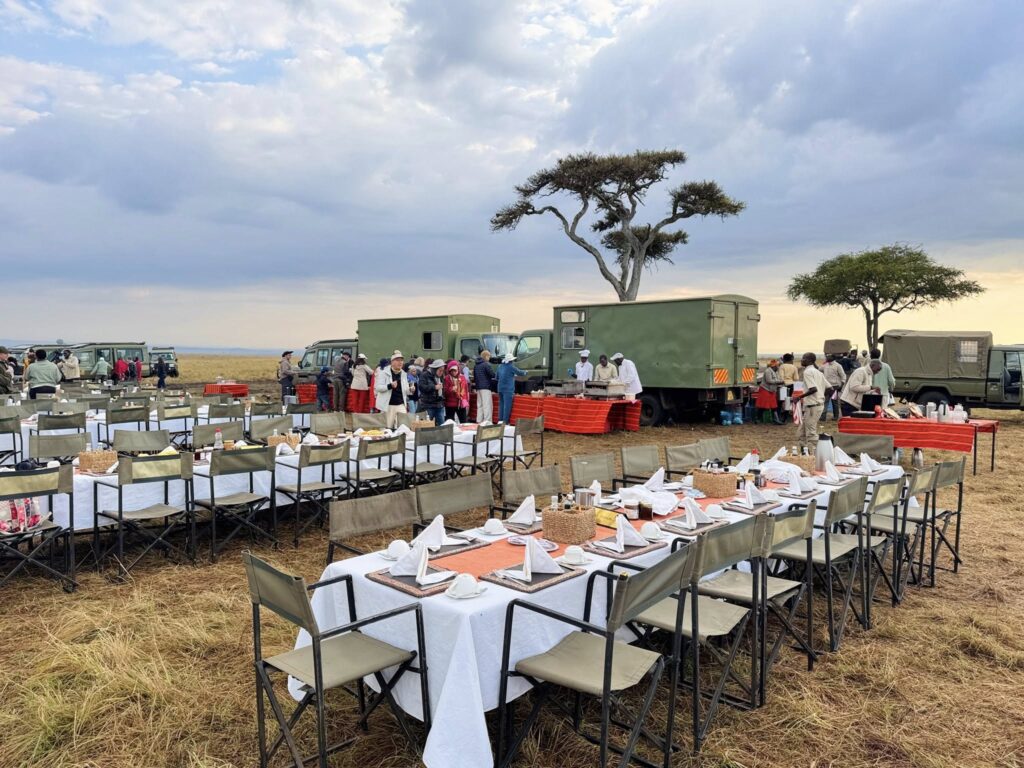 tourists having lunch at masai mara