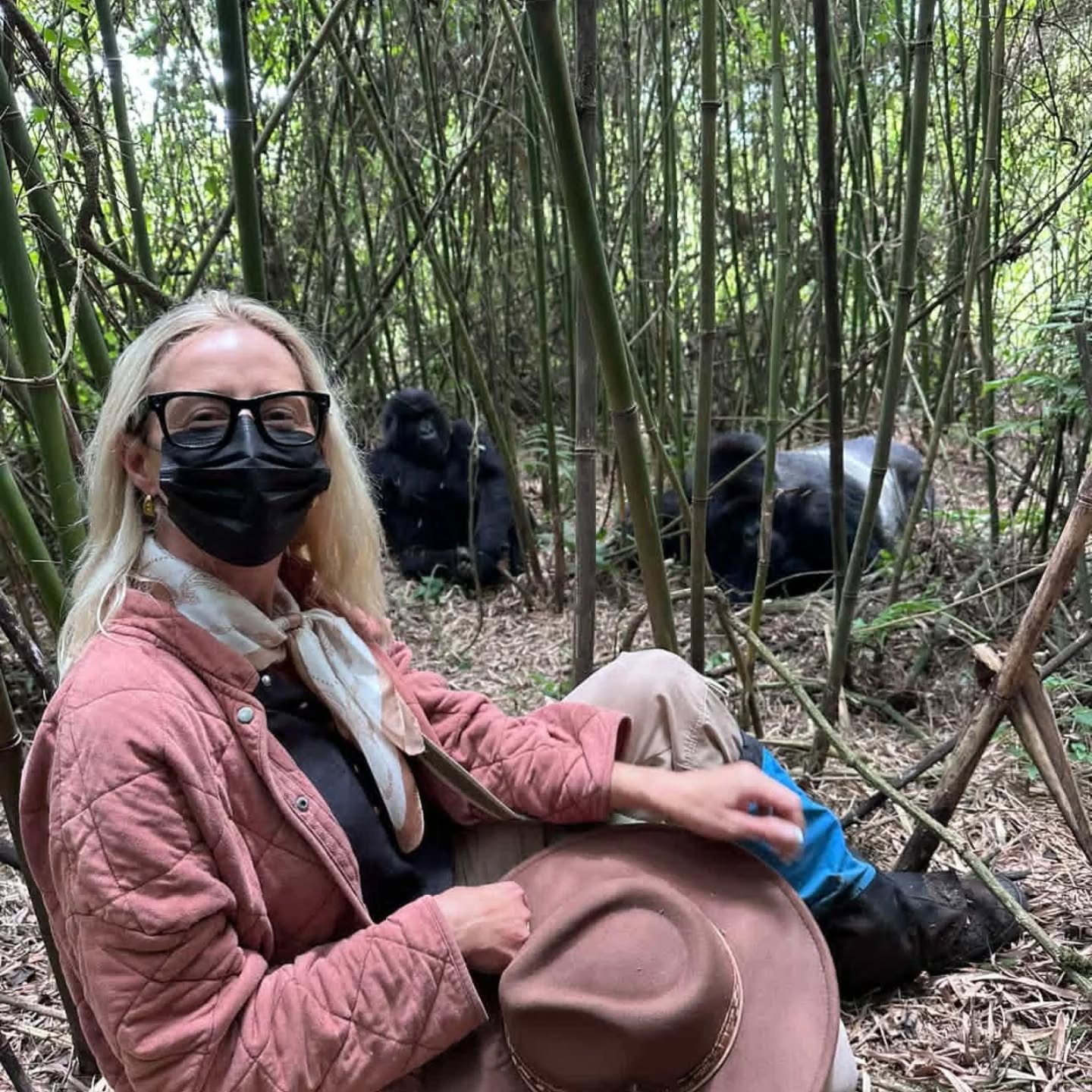a tourist at Volcanoes National Park where she is doing gorilla trekking in Rwanda