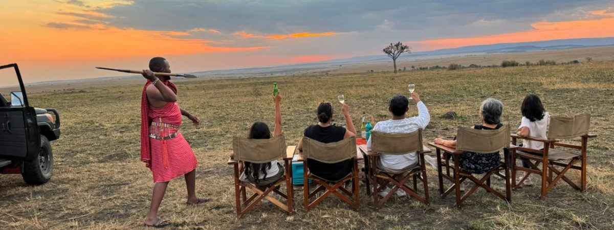 Happy guests enjoying an African sunsowner in Kenya - book Big Five Africa wildlife safaris in Kenya and Tanzania with Twinkle Star Tours & Safaris